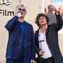 Wim Wenders, verre de contraste à l'œil, et Gilles Porte à l'approche d'une fausse teinte - Photo Sandrine Thesillat 